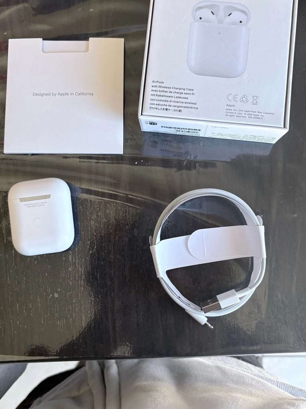 Apple White AirPods with Charging Case and Lightning Cable